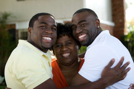 African American mother and her adult sons.の写真素材