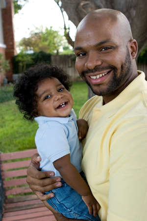 African American father and his little boy.
