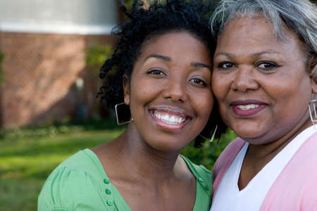 Happy African American mother and her daugher.の写真素材