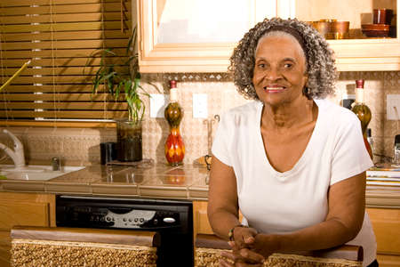 Portrait of an elderly African American woman at home.の写真素材