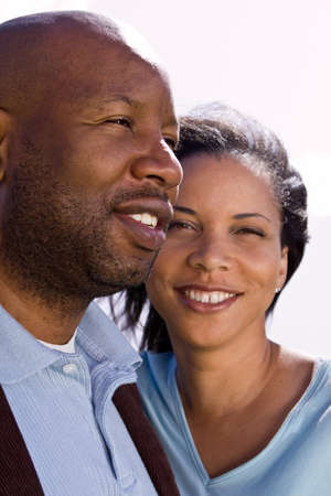 Happy African American couple laughing and smiling.の写真素材