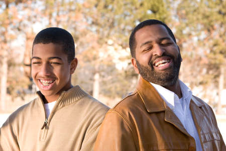 African American father and his teenage son.