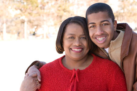 African American mother and her teenage son.の写真素材