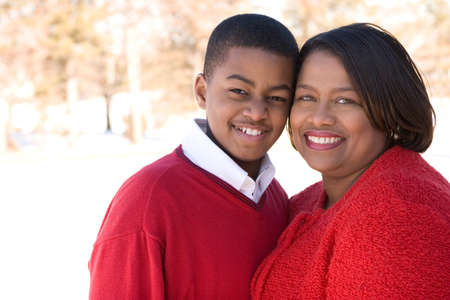 African American mother and her teenage son.の写真素材