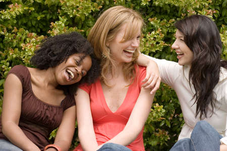 Diverse woman in a small group talking.の写真素材
