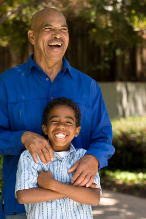 African American father and his adult son.
