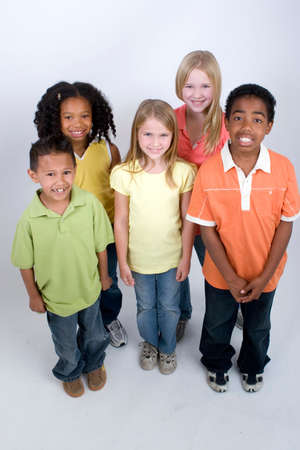 Happy diverse group of kids isolated on white.