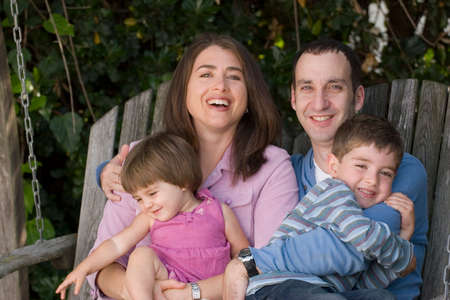 Portrait of a happy family smiling and laughing.の写真素材