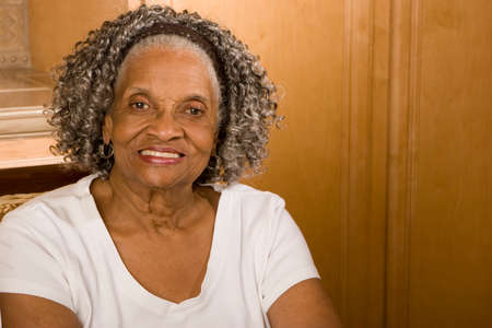 Portrait of an elderly African American woman at home.