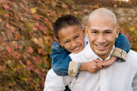 Happy Asian father and his little boy.の写真素材