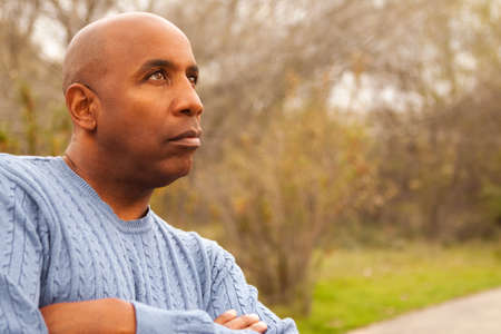 Mature African American man looking sad.の写真素材