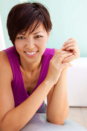 Asian woman exercising at the gym.の写真素材