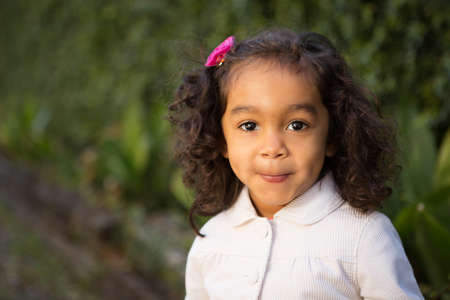Little girl playing at the park.の写真素材