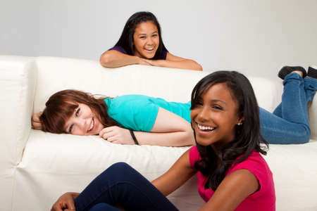 Diverse group of teens isolated on white.の写真素材