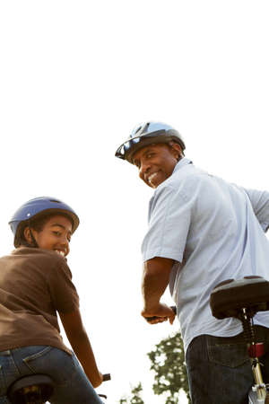 Father and son riding bikes.の写真素材