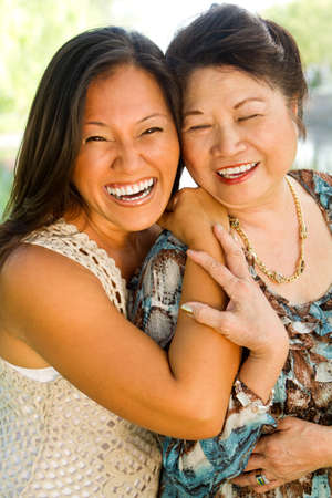 Asian mother and her adult daughter.の写真素材