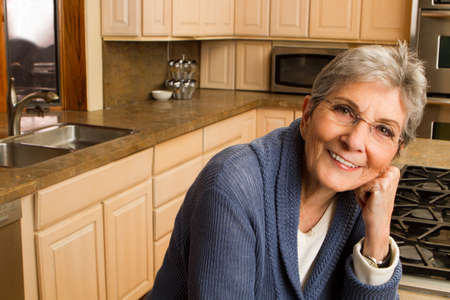 Confident mature older woman at home.の写真素材