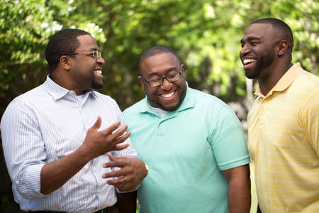 Brothers laughing and talking.の写真素材