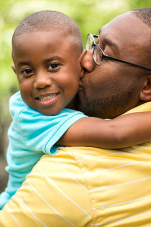 Father hugging his his son.の写真素材