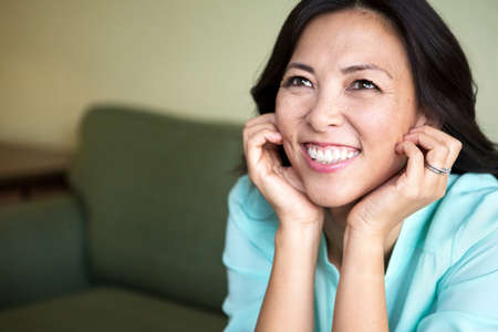 Portrait of an Asian woman smiling.の写真素材