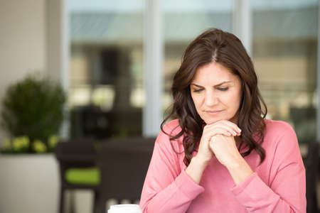 Depressed middle age woman.