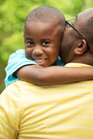 Father hugging his his son.の写真素材