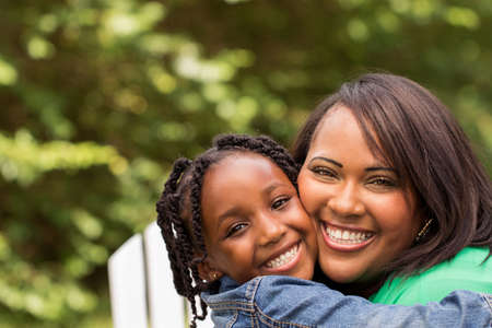 Happy African American mother and daughter.の写真素材