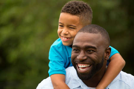 Father and son playing outside.の写真素材