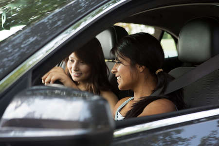 Friends driving taking a road trip.の写真素材