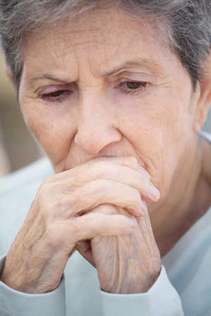 Mature woman feeling lonely and depressed.の写真素材