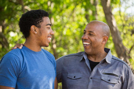 Father talking and spending time with his son.の写真素材