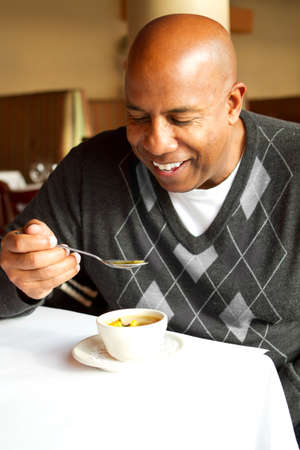 Mature man at a restaurant.