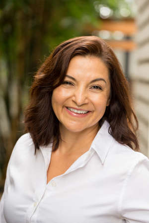 Happy Hispnaic woman smiling.の写真素材