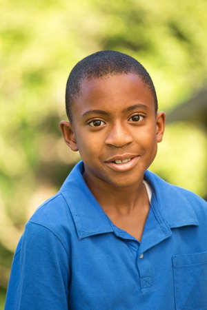 African American young boy smiling.