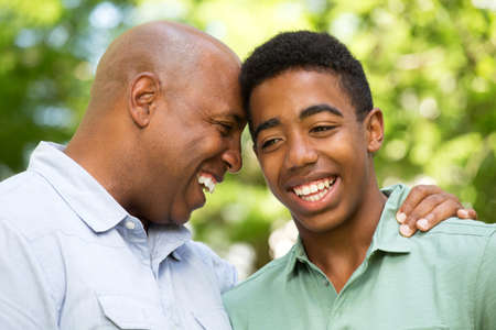 African American father and teen son.