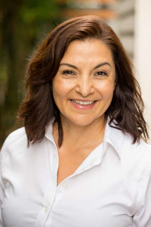 Happy Hispnaic woman smiling.の写真素材
