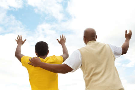 African American father and teen son.