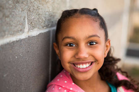 Little girl smiling.