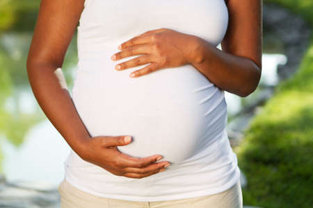 Pregnant womans stomach.
