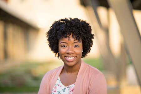 Happy African American woman smiling.