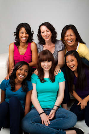 Diverse group of mothers and daughters.の写真素材