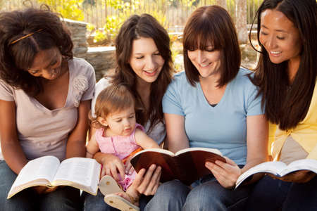 Diverse group of women talking and laughing.の写真素材