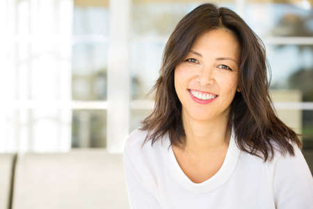 Portrait of an Asian woman smiling.の写真素材