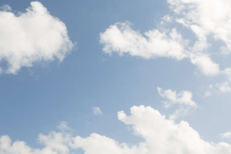 Landscape of a clear blue sky with white clouds.