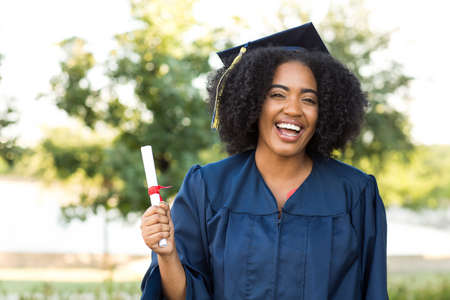 Young African American woman graduating from school.の写真素材