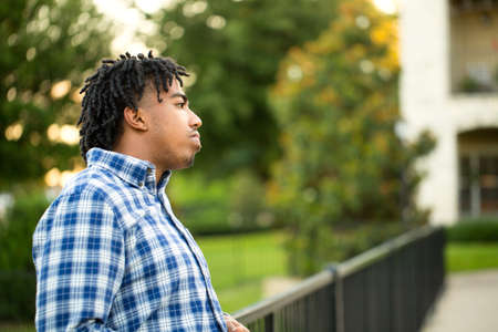 Young African American man in deep thought.の写真素材