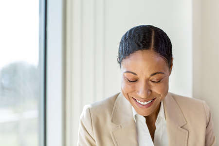 Portrait of African American business woman at work.の写真素材