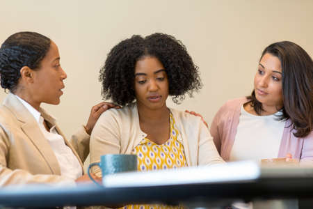 Woman talking about their problems at work.の写真素材