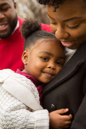 Happy African American family with their baby.の写真素材