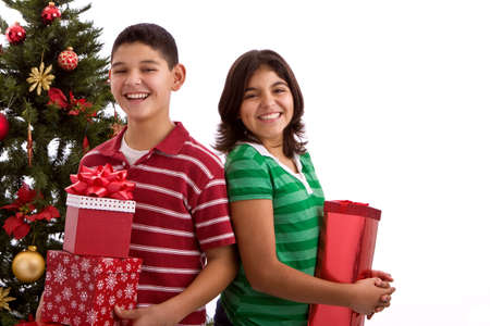 Happy brother and sister at Christmas time.の写真素材